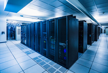 Rows of server racks in data center