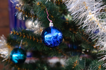 New Year's toy on the tree. Christmas decoration.