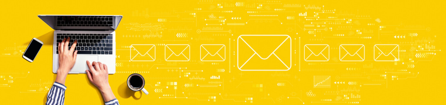 Email concept with person using a laptop computer