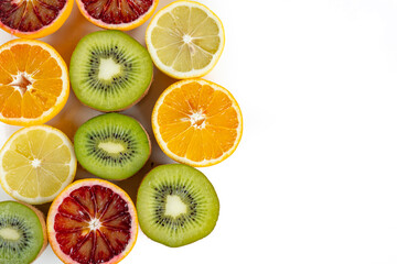Fototapeta na wymiar set of fruits with vitamin c, kiwi, lelon, red orange, yellow orange in a cut isolate on white