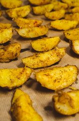 Baked potatoes in the oven close-up