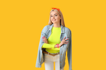 Beautiful young woman on color background