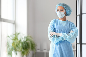 Portrait of female surgeon in clinic