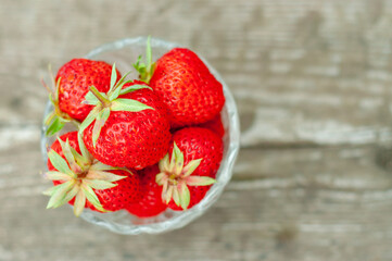 strawberries on wooden background