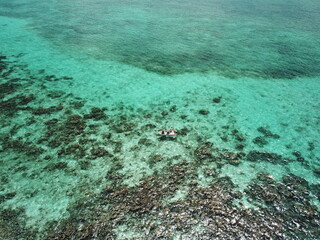Fishermen fishing in the Caribbean Sea in their boat