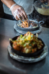 Indian kebab platter in sizzling plate