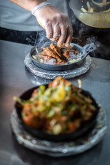 Indian kebab platter in sizzling plate