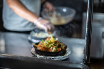 Indian kebab platter in sizzling plate