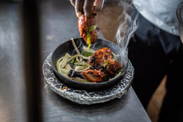 Indian kebab platter in sizzling plate
