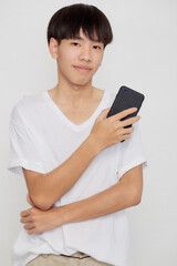 Fototapeta premium Asian Man holding of mobile phone