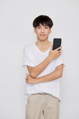 Fototapeta premium Asian Man holding of mobile phone