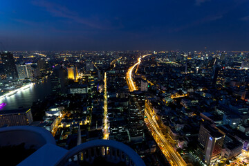 Fototapeta premium Bangkok city from above illuminated at night