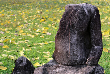 Fototapeta premium Ruins of Buddha statues of Ratchaburana temple in the Ayutthaya Historical Park, Ayutthaya, Thailand