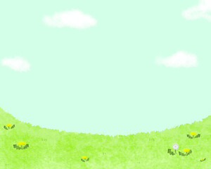 空とたんぽぽの咲く野原