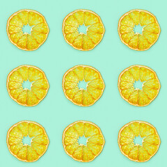 Seamless pattern from  dehydrated fruit chips of tangerine. Diet food concept. Minimal style.