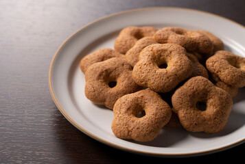 Japanese baked goods set against a wooden background. Sobaboro