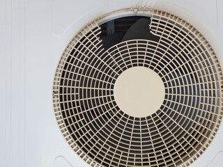 The Air compressor condensing fan's cover is torn due to outdoor installation and exposed to the sun all day long. Plastics that have been used for a long time are often crunchy and fragile.
