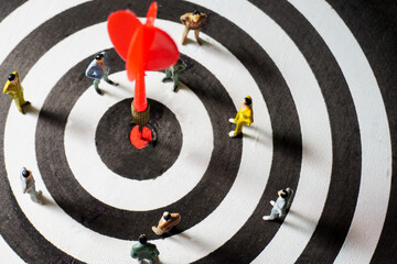Business strategy conceptual photo. Group of businessman miniature figures standing and meeting on...