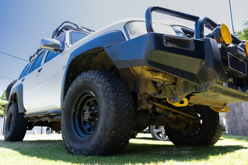 Low angle view of 4WD vehicle on a sunny day
