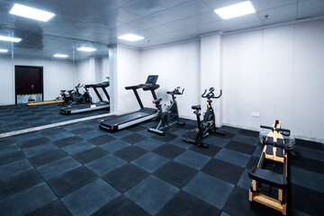 Indoor fitness equipment in a small gym