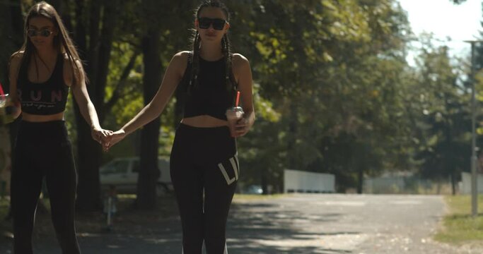 Girls rollerblading in the park