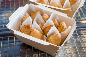 Set of curry puff in paper box.