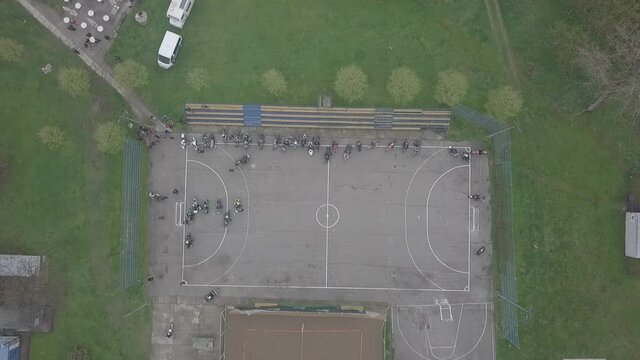 Above shot of motorcyclists on a playing field at Brcko district in Bosnia and Herzegovina