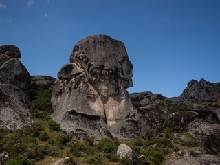 Head shaped rock formation at Marcahuasi andes plateau mountain hill valley nature landscape Lima...