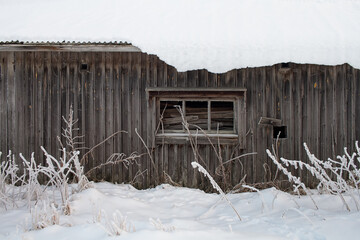 Empty Window On An Old Barn Wall