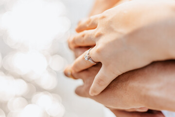 romantic couple hug together on the beach at summer. Honeymoon, travel, holiday, summer concept.