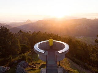 Sunrise panorama of Mirador El Fitu Del Fito viewpoint stairs Caravia Baja Picos de Europa...