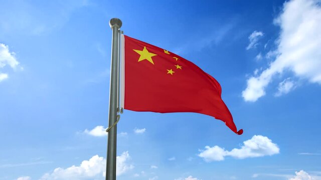 The flag of China fluttering in the wind, under the blue sky and white clouds