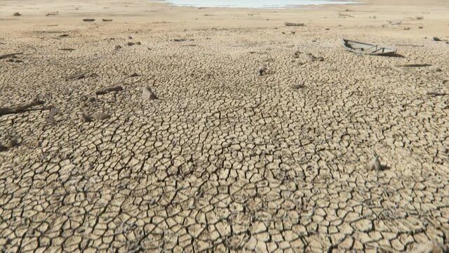 The land dries up and cracks apppear. Bones of dead fish and animals are exposed. Water slowly dries up. Ecological balance is disturbed.
