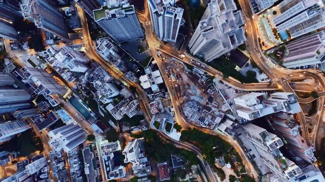 Aerial view of Hong Kong high rise buildings and streets illuminated at night