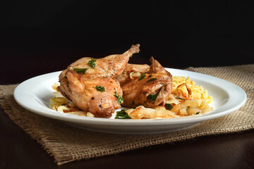 Quail fried in beurre noisette sauce and caramelized onion rings.