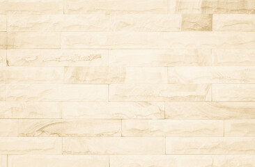 Obraz premium Empty background of wide cream brick wall texture. Beige old brown brick wall concrete or stone textured, wallpaper limestone abstract flooring/Grid uneven interior rock. Home decor design backdrop.