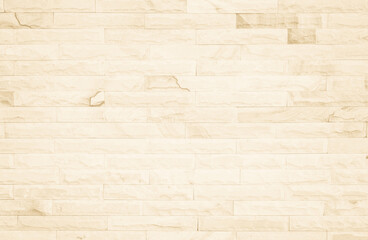 Obraz premium Empty background of wide cream brick wall texture. Beige old brown brick wall concrete or stone textured, wallpaper limestone abstract flooring/Grid uneven interior rock. Home decor design backdrop.