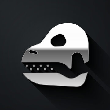 Silver Dinosaur skull icon isolated on black background. Long shadow style. Vector.