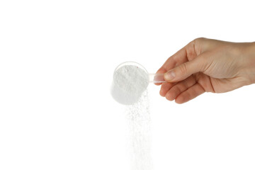 Female hand pouring washing powder, isolated on white background