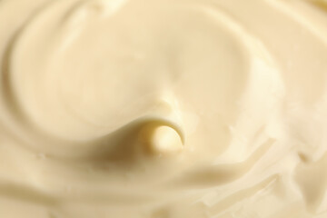Fototapeta na wymiar Mayonnaise sauce texture on whole background, close up