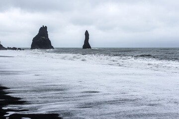 Reynisfjara is a world-famous black-sand beach on the South Coast of Iceland.