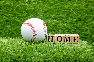 Baseball is on green grass