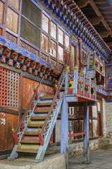 Fototapeta na wymiar Colorful stairs in beautiful Wanduechhoeling or Wangdicholing palace in Jakar, Bumthang, central Bhutan 