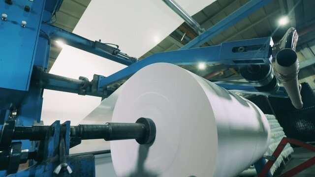 Modern paper converting machine at a paper manufacturing plant