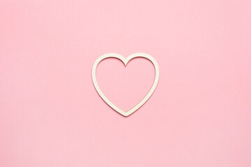 Heart shape on pastel pink background. Concept Valentine's card. Top , copy space for text