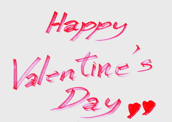 Happy valentine's day was writing with red ink on white paper