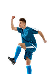 Fototapeta premium Jumping. Funny emotions of professional soccer player isolated on white studio background. Copyspace for ad. Excitement in game, human emotions, facial expression and passion with sport concept.
