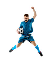 Flying high. Funny emotions of professional soccer player isolated on white studio background. Copyspace for ad. Excitement in game, human emotions, facial expression and passion with sport concept.