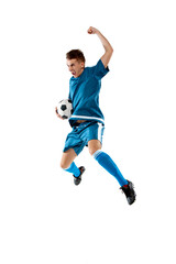 Flying high. Funny emotions of professional soccer player isolated on white studio background. Copyspace for ad. Excitement in game, human emotions, facial expression and passion with sport concept.
