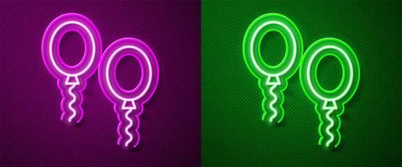 Glowing neon line Balloons with ribbons icon isolated on purple and green background. Vector.